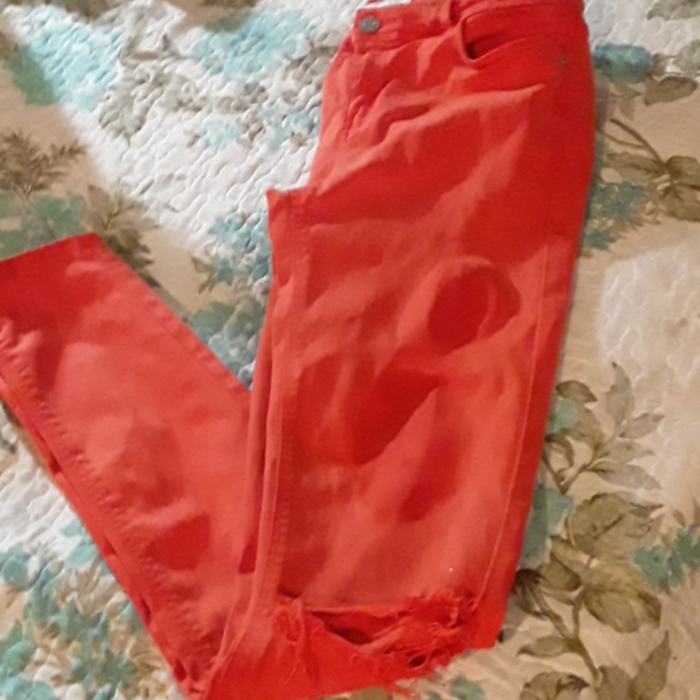 Orange skinny stretch jeansw/ hole in knees